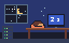 The founder asleep at the desk while the monitor and the server rack keep running